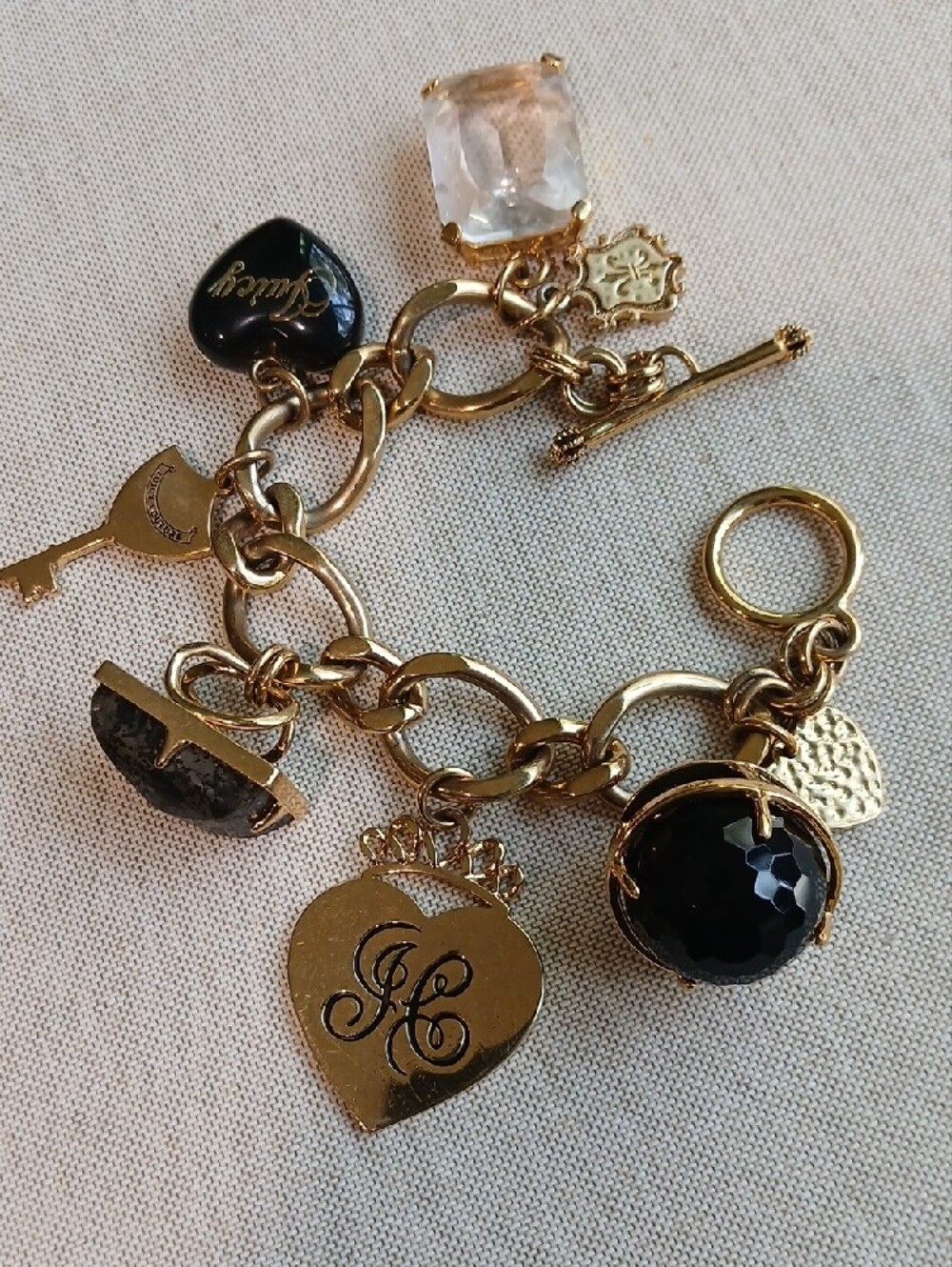 Vintage Juicy Couture Y2K Gold-Tone Black Chunky Hearts and Charms Bracelet